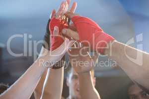 Young boxers giving high-fives