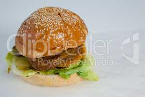 Close-up of hamburger on paper