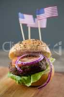 Close up of hamburger with american flag