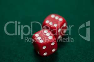 Pair of dice on poker table