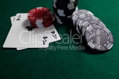 Playing cards and casino chips on poker table