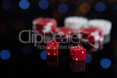 Close-up of red dices with chips