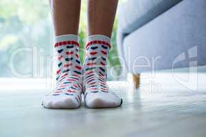 Low section of girl wearing socks