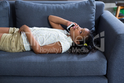 High angle view of girl talking on phone