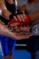 Close-up of boxers stacking hands