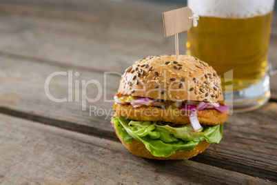 Close up of burger with beer