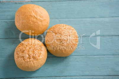 Close up of baked buns on table