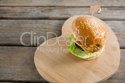 Cheeseburger on heart shape cutting board