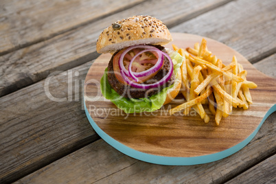 High angle view of hamburger with French fries