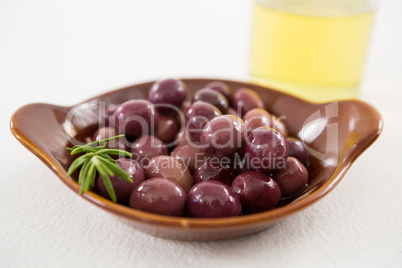 Close-up of marinated olives in bowl