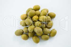 Close-up of marinated green olives