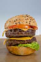 Close-up of hamburger on brown paper