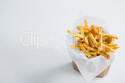 High angel view of French fries in paper bag
