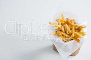High angel view of French fries in paper bag