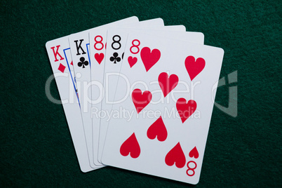 Playing cards arranged on poker table