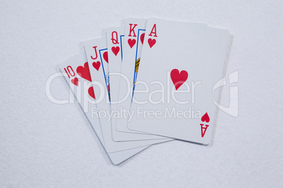 Playing cards arranged on white background