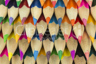 Wooden crayons as background picture.