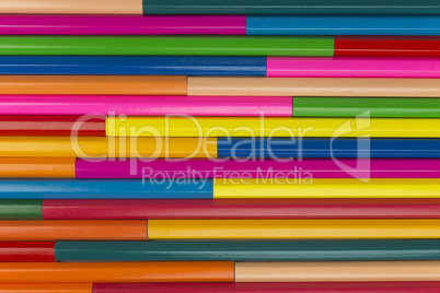 Wooden crayons as background picture .