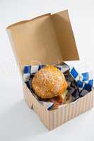 Close up of cheeseburger in box