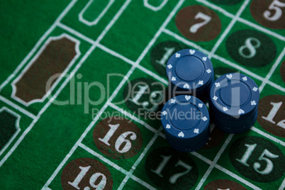 High angle view of blue chips on table