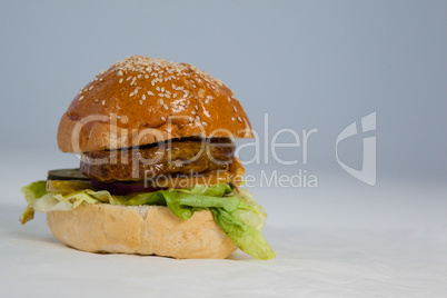 Close-up of hamburger on paper