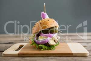 Close up of burger with cottage cheese and jalapeno pepper