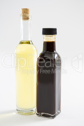 Green and purple olive oil bottles