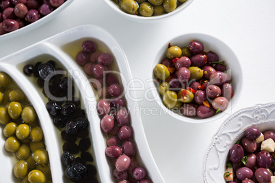 Pickled olives on white background
