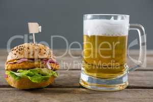 Close up of hamburger with beer glass