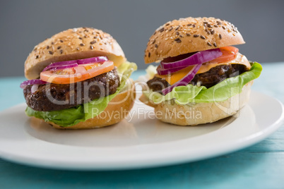 Close up of hamburgers in plate