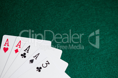 Playing cards arranged on poker table