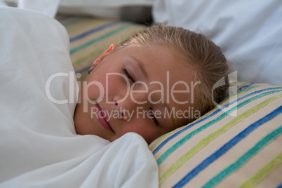 Close up of girl sleeping in bed