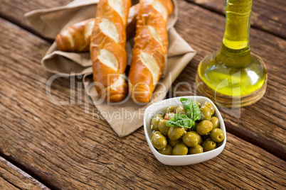 Marinated olives with olive oil and breakfast