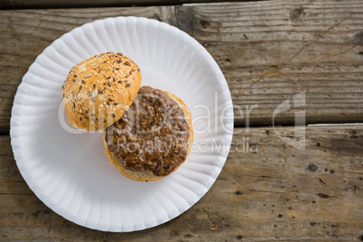 Overhead view of hamburger in plate