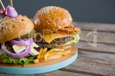 Close up of burgers with french fries