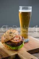 Close up of hamburger with beer