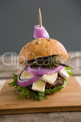 Burger with jalapeno pepper and cottage cheese