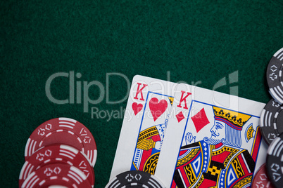 Playing cards and casino chips on poker table