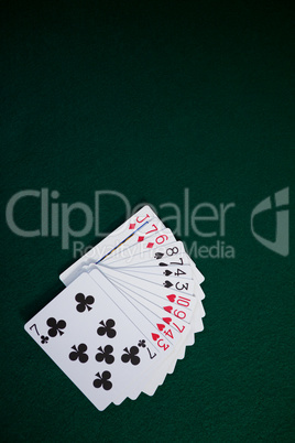 Playing cards arranged on poker table