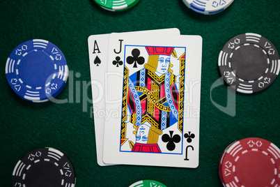 Playing cards and casino chips on poker table