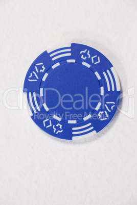 Blue casino chip on white background