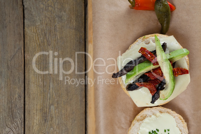 Burger on wooden plank