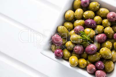 Close-up of marinated olives in bowl