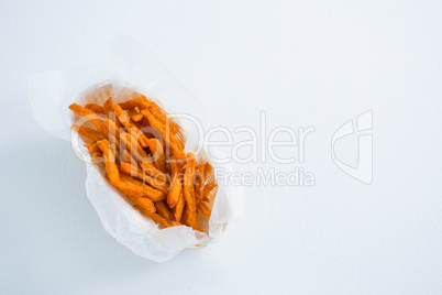 Close up of French fries in container