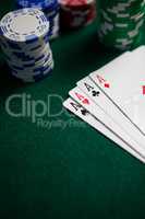 Playing cards and casino chips on poker table