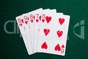 Playing cards arranged on poker table