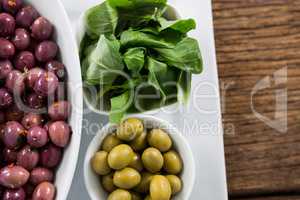 Marinated olives with herbs in bowl