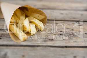 Close up of french fries in paper