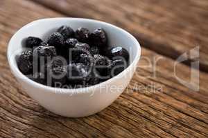 Dry olives in white bowl