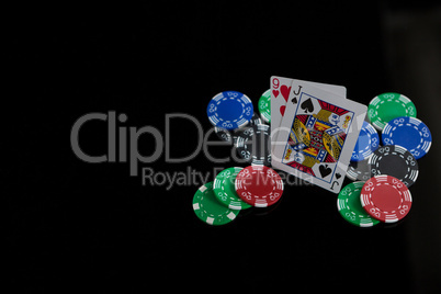 Close-up of cards and chips during poker game